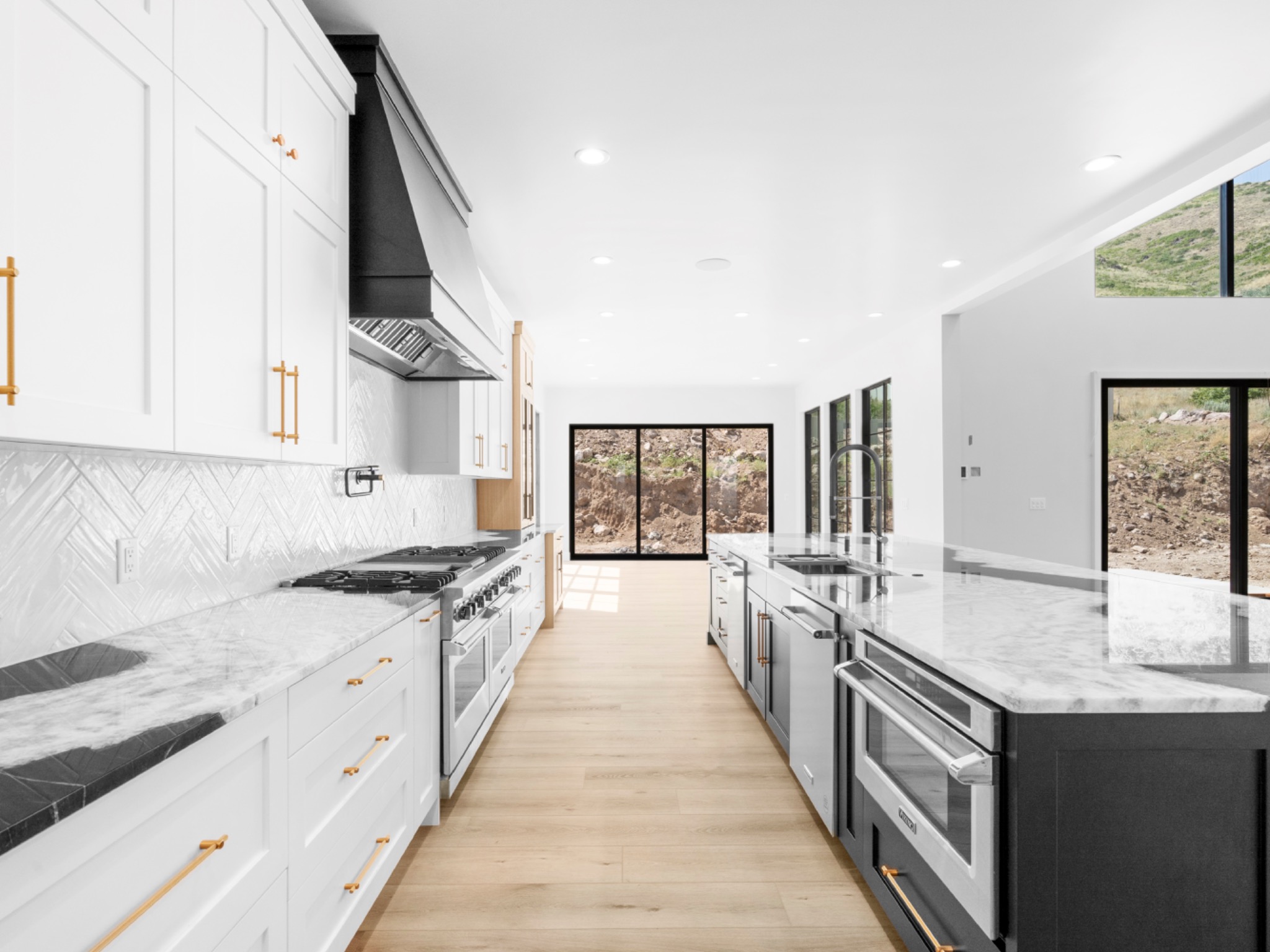 White kitchen with dark island